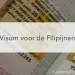 visumstickers Filipijnen in paspoort in het midden de tekst: Visum voor de Filipijnen"